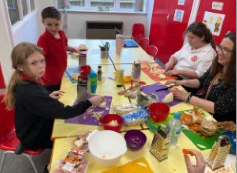 children and teacher enjoying cooking activities